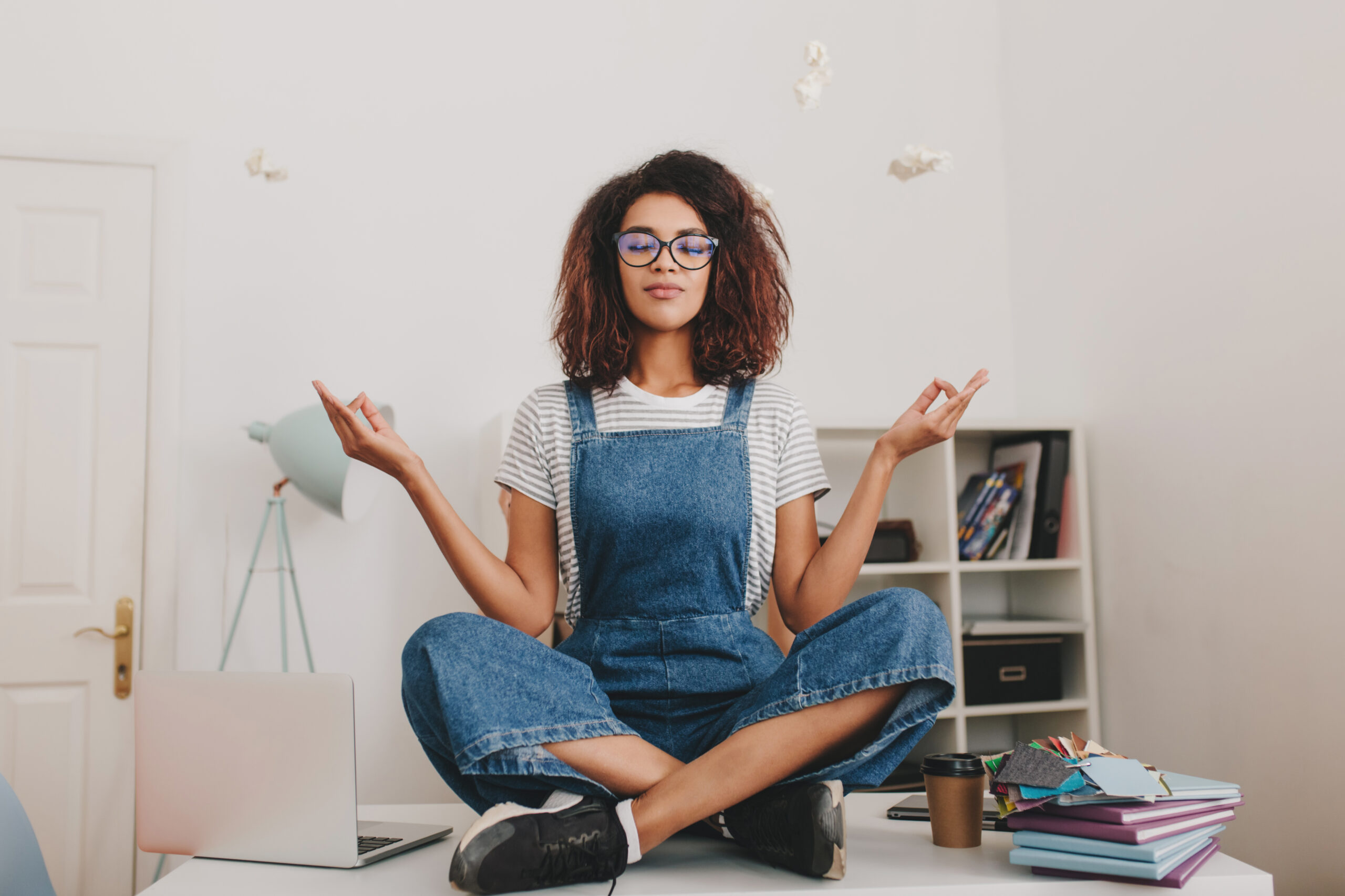 Lady Meditating on her work desk